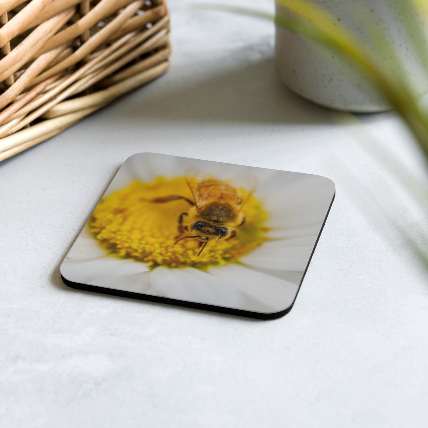An artisan coaster titled 'Pollen Haven' by Warlock Photography, featuring a high-detail macro photograph of a Western Bee covered in pollen on a yellow flower