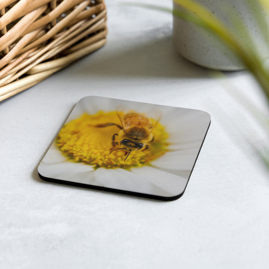 An artisan coaster titled 'Pollen Haven' by Warlock Photography, featuring a high-detail macro photograph of a Western Bee covered in pollen on a yellow flower
