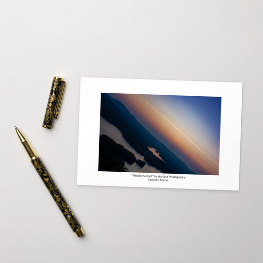 A captivating landscape of Camden, Maine at dusk. This premium art postcard features a rich tricolor gradient of twilight blues, warm oranges, and soft pinks. Printed on thick, high-quality matte paper.